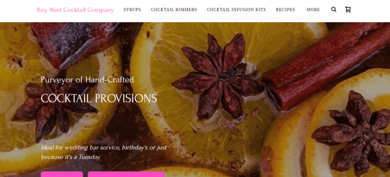 homepage for cocktail website featuring cut oranges and spices